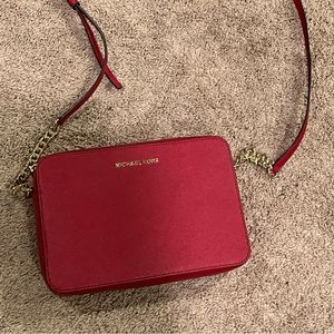 Michael kors red bag never used in perfect condition